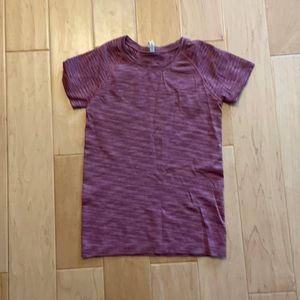 Athleta momentum tee is pink spacedye color.